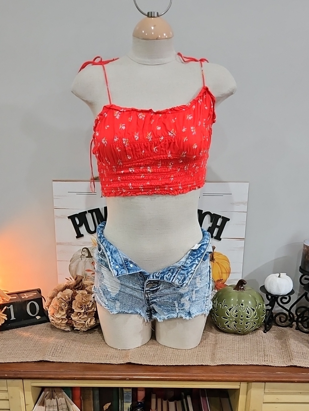 Free People Red Floral Tie-Shoulder Smocked Crop Top & Indigo Rein Cutoffs.